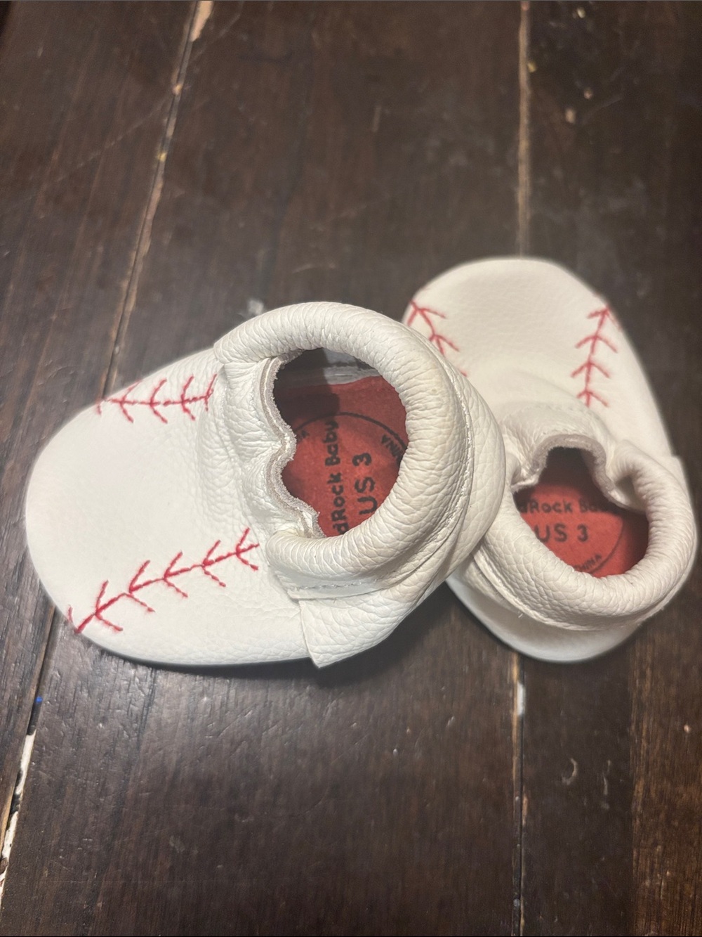 Hard Rock Cafe White Baby Moccasins with Red Stitching